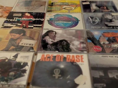 12 Maxi CDs Single Youssou N´Dour Neneh Cherry Junkster Bobo in white wooden hou - Bild 1 von 4