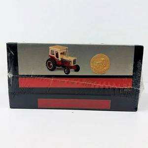 ERTL IHC’s 66 Series 5,000,000 Tractor & Collectors Coin, 1/64 Scale 4590-30EA - Picture 1 of 6