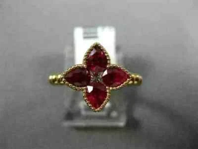 Alianza de boda para mujer simulada de rubí rojo corte pera de 3 quilates enchapada en oro amarillo de 14 quilates Foto 1 de 4