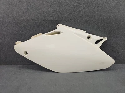 01-07 HONDA CR125R CR250R PLACA DE MATRÍCULA TRASERA IZQUIERDA PANEL DE CUBIERTA OEM USADO EN MUY BUEN ESTADO Foto 1 de 4