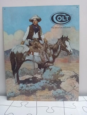 COLT THE ARM OF LAW AND ORDER TIN SIGN 16"X12" - Image 1 of 4