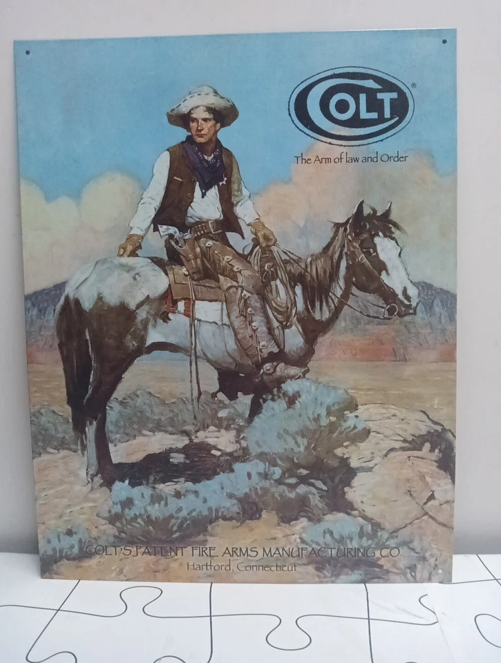 COLT THE ARM OF LAW AND ORDER TIN SIGN 16"X12" - Image 1 of 4