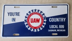 NOS VINTAGE GM SAGINAW MI. UAW LOCAL 699  UNION LICENSE VANITY PLATE TOPPER - Picture 1 of 9