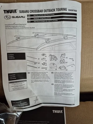 Barras transversales Subaru Touring OEM Thule S0A567X020 para barra transversal de techo Outback.   Foto 1 de 4