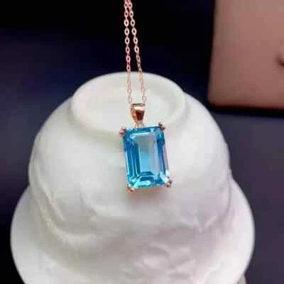 Colgante de topacio azul creado en laboratorio esmeralda de 2 quilates cadena gratis enchapado en oro rosa de 14 quilates Foto 1 de 4