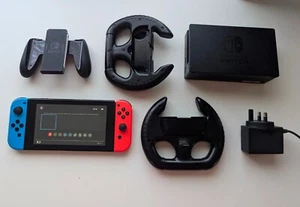 Nintendo Switch 32GB + TV Dock + Joycons + Wheels + Case PAL UK Seller - Picture 1 of 7