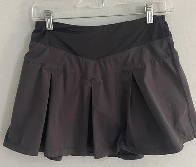 Pantalón corto/falda de tenis negro Ivivva by Lululemon para niñas talla 14 Foto 1 de 4