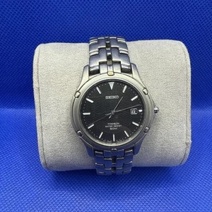 38.6mm.Mans Quartz SEIKO Watch.Over Holed.New Battary.Metal Titanium Band - Picture 1 of 6