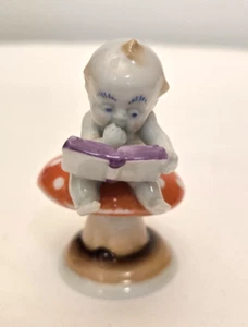 Pequeña estatuilla de colección Metzler Ortloff Alemania Kewpie hongo sapo taburete libro - Imagen 1 de 11