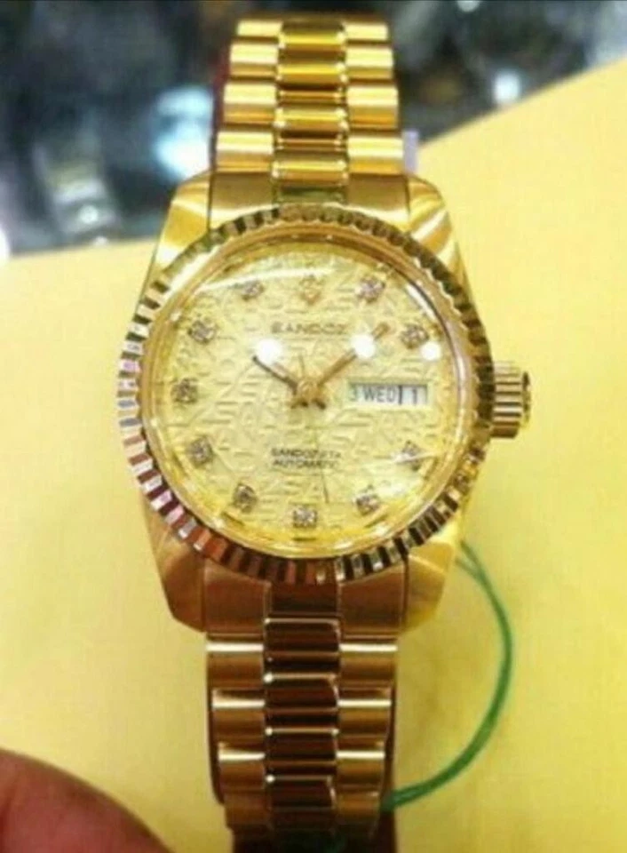 Reloj automático para dama Sandoz tono dorado acero inoxidable 398235D12-8 Foto 1 de 1