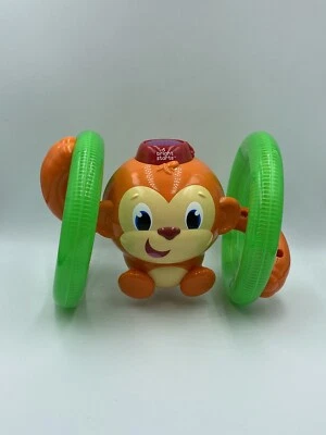 "Juguete musical iluminado para niños Kids II Bright Stars Rolling Monkey funciona 7""" Foto 1 de 4