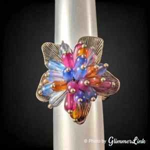 Anillo elástico con cuentas colorido flor hawaiana Avon - Imagen 1 de 7