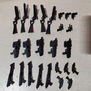 Posten 25 Stck. Star Wars Black Series Blaster Pistole Gewehr Waffe für 6" Figur - Bild 1 von 2