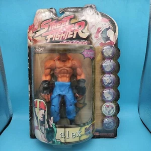 RESAURUS CAPCOM STREET FIGHTER ROUND ONE ALEX FIGURE ACTION CARDED BLUE PLAYER - Imagen 1 de 3