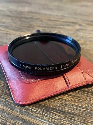 VINTAGE CANON POLARIZER FILTER FOR CANON SLR CAMERA-55mm WITH PROTECTION POUCH - Image 1 of 4