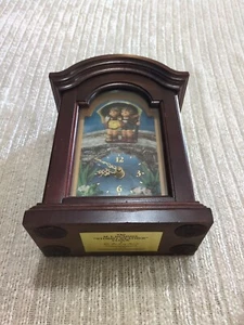 RELOJ M. I. HUMMEL "CLIMA TORMENTOSO" Danbury Mint. - Imagen 1 de 8