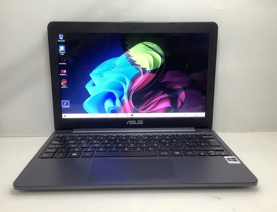 ASUS VIVOBOOK  E203M,INTEL N4000,4GB RAM,32+250 GB SSD,WINDOWS 10 Home - Image 1 of 4