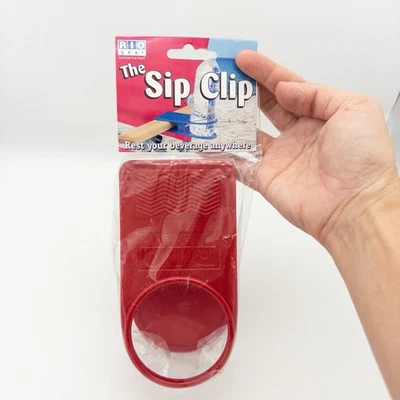 RIO Gear The Sip Clip Rojo Porta Bebidas Taza Botella Clip-On Playa Silla Mesa Foto 1 de 4