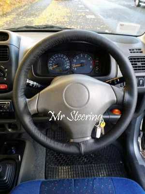 FOR SUZUKI IGNIS (00-08) BLACK ITALIAN LEATHER STEERING WHEEL COVER BEST QUALITY - Image 1 of 2