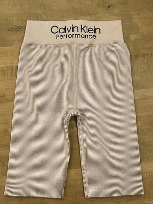 Велосипедные шорты стрейч Calvin Klein Performance высокая талия, маленькие розово-лиловые - Изображение 1 из 4