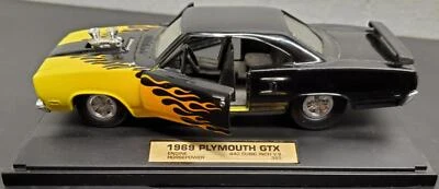 Juguete Tootsie cuerpo duro 1969 Plymouth GTX negro con llamas modelo fundido a presión coleccionable Foto 1 de 4