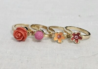 Conjunto de 4 anéis de tom dourado pedras rosa e laranja tamanhos são 7, 7,5 e 9 J4-1568 - Imagem 1 de 4