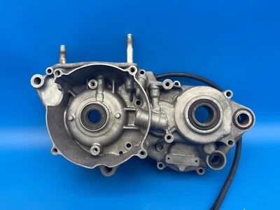 Honda CR250 CR250R CR 250 1999 cárter izquierdo cárter cigüeñal medio extremo inferior dañado Foto 1 de 4