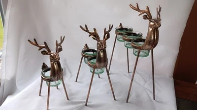 Metal Copper Color Reindeer Votive Holder Set 12" 10" & 8" Tall - Image 1 of 4
