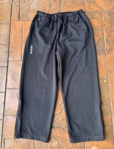 Pantalones deportivos Nike vintage Y2K XL negros holgados pierna ancha deletreados - Imagen 1 de 10