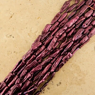 4mm x 18mm Burgundy, Garnet Freshwater Biwa stick Pearls, approximately 21 beads - Image 1 of 4