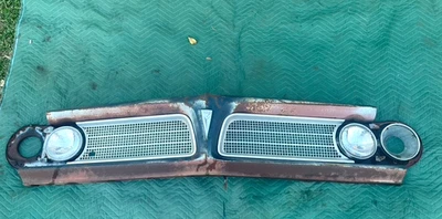 Pontiac Tempest 1963 rejilla cenefa y montaje de luz de cabeza pequeña abolladura original Foto 1 de 4