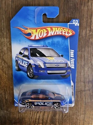 Hot Wheels Ford Fusion; 2009 HW City Works Series; Blue Police Cruiser 03/10 - Image 1 of 3