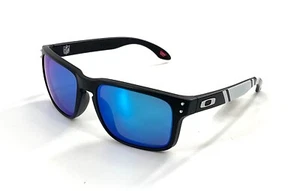 Occhiali da sole uomo Oakley Dallas Cowboys Holbrook 009102 neri nuovi con lenti blu - Foto 1 di 7