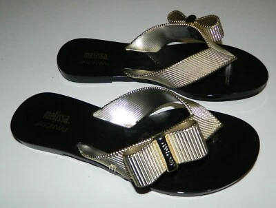 Melissa + JASON WU women's Gold Black RIBBON BOW Flip Flop Thing Sandals*  5 - Image 1 of 4