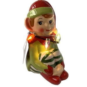 Mr. Christmas “Follow the Magic” Ceramic Light Up Knee Hugger Elf Ornament - Picture 1 of 11