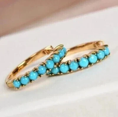 Pendientes tipo argolla para mujer de zafiro creado en laboratorio de corte redondo de 3 quilates con acabado en oro amarillo de 14 quilates Foto 1 de 4