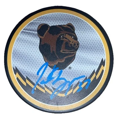 Disco de hockey retro firmado por Patrice Bergeron Boston Bruins Foto 1 de 2