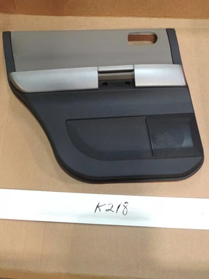 New OEM Rear LH Trim Panel 2004-2006 Mitsubishi Endeavor MN177322 Black Tan  - Image 1 of 2