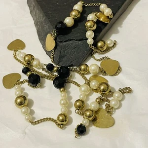 Lange Perlenkette mit goldenen Herzen und schwarz-weißgoldenen Perlen an Kette 46 Zoll - Bild 1 von 7