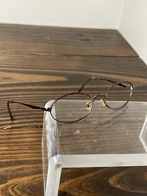 Marco ovalado de borde completo de metal cromado marrón Ray-Ban RB3103-W3096 para mujer Foto 1 de 4