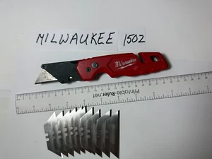 CUCHILLO UTILITARIO PLEGABLE MILWAUKEE 48-22-1502 FASTBACK CON 10 HOJAS $12@ OBO PUEDE GANAR - Imagen 1 de 8