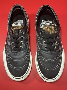 black leather vans era