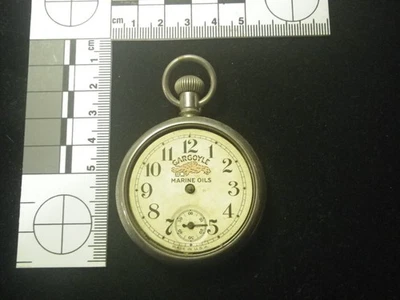Лот # 11 - ГОРГУЛЬЯ МОРСКИЕ МАСЛА реклама карманные часы золото заполненное? INGERSOLL - Изображение 1 из 4