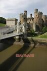 PHOTO  CONWY CASTLE CONWY CASTLE AND TELFORD'S SUSPENSION BRIDGE VIEWED FROM THE