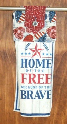 BANDERA PATRIÓTICA Y CORAZONES "HOGAR DE LOS LIBRES POR LOS VALIENTES" TOALLA DE MANO Foto 1 de 4