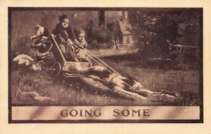 Niños "Going Some" siendo tirados por perro persiguiendo conejo publicado en 1910 - Imagen 1 de 2