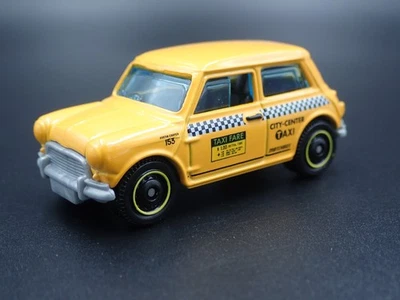 Modello Auto Diecast In Scala 1:64 Taxi Cab Giallo Austin Mini Cooper 1959-1967 - Immagine 1 di 4