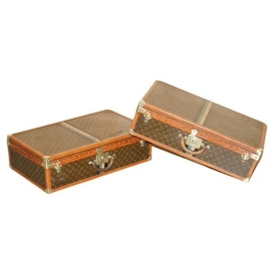 DECORATIVE PAIR OF RESTORED ANTIQUE LOUIS VUITTON MONOGRAM SUITCASE TRUNKS - Image 1 of 4