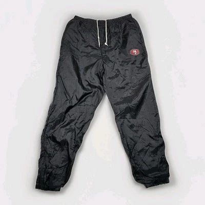 Pantalones deportivos de colección San Francisco 49ers para hombre L cortavientos calentamientos forrados cremallera al tobillo Foto 1 de 4