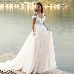 Elegant A-Line Off-The-Shoulder Tulle Wedding Dress with Lace Appliques - Picture 1 of 8
